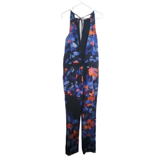 Size 4 Marciano navy blue and orange floral jump suit, deep v front and back - Picture 3 of 7
